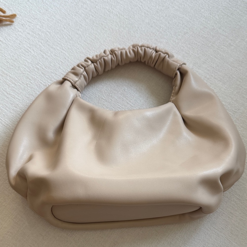 Elegant Cream/bone colored Women's hand Bag. “The Drop”